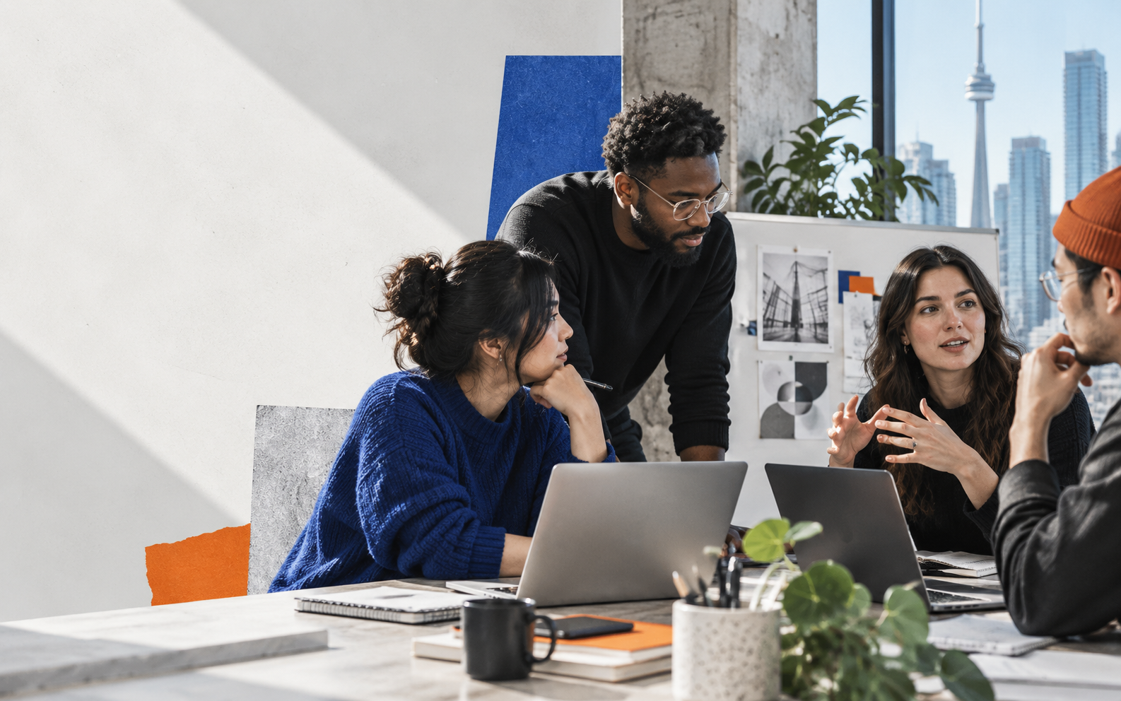 Canadian software professionals working together in a bright studio